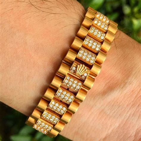 gold rolex style bracelet.